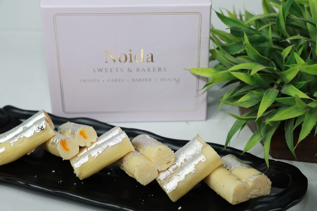 Khoya rolls with silver vark — our photo