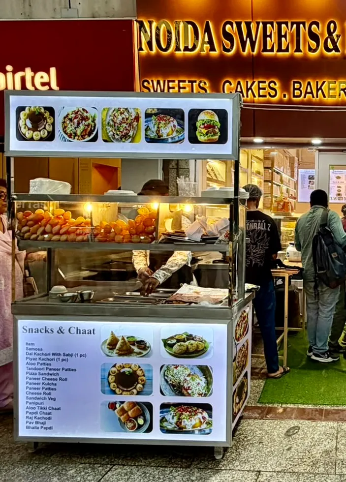 Our live chaat counter — our photo Live chaat counter with golgappa and tikki at Noida Sweets and Bakers, Greater Noida