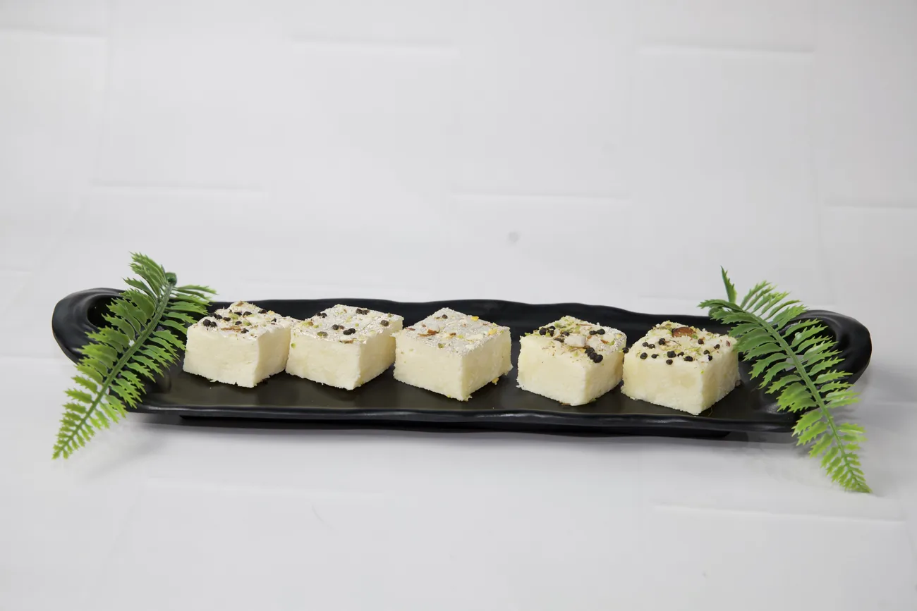 Plain khoya barfi with assorted toppings — our photo