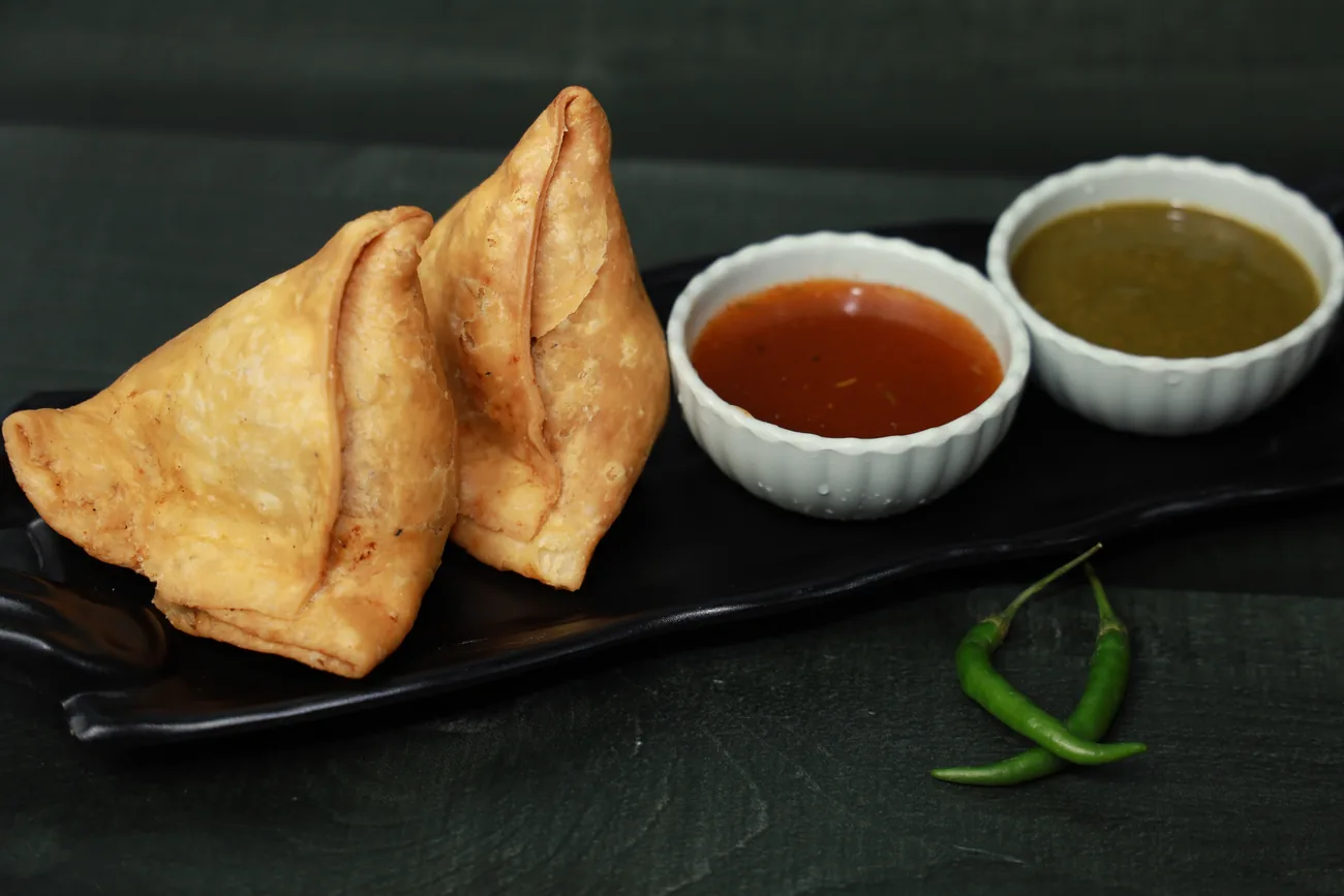 Samosas with mint and tamarind chutney — our photo